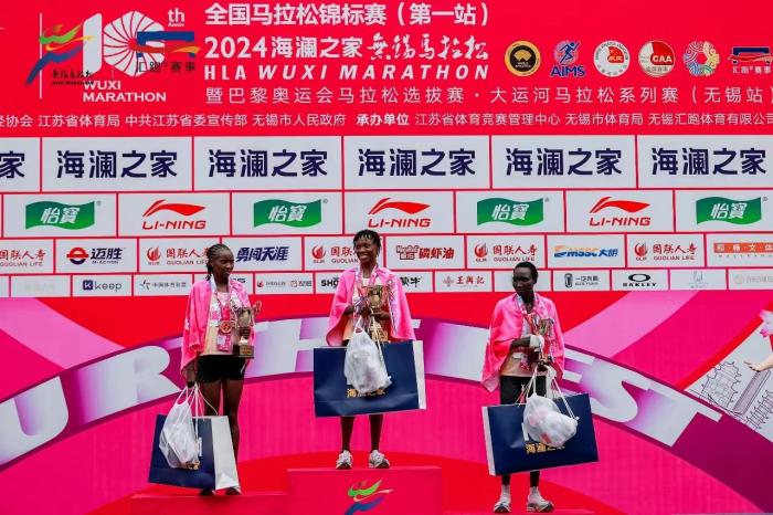 2024无锡马拉松男女选手均破赛会纪录,何杰刷新