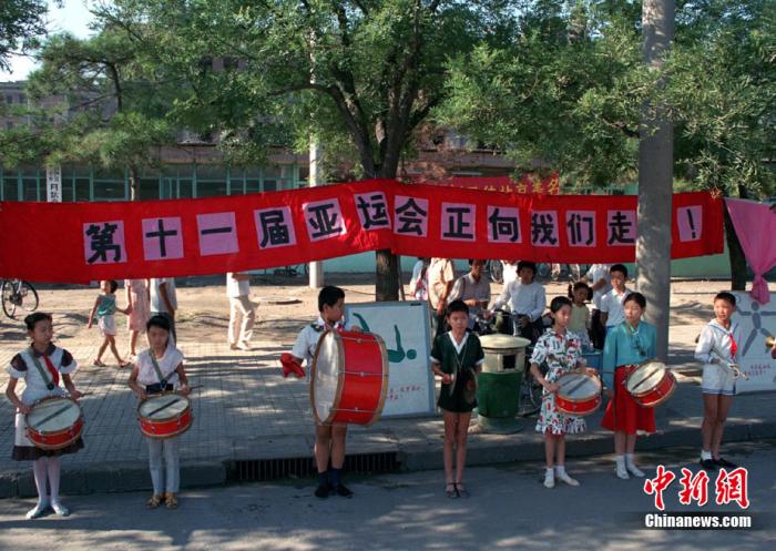 八问寻记：藏在亚运口号里的故事，你还记得吗